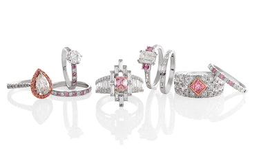 Collection of Classic and Contemporary Pink Argyle Diamond rings on a white background