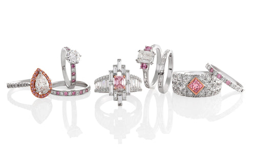 Collection of Classic and Contemporary Pink Argyle Diamond rings on a white background