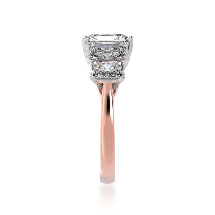 Five stone radiant cut diamond ring on a rose gold band view from side