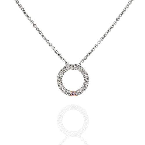 White Gold necklace with a circular diamond pendant on a white background