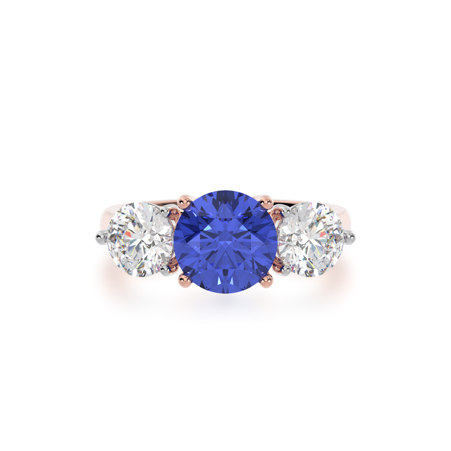 Round Brilliant cut trilogy blue Sapphire and Diamond ring on rose gold band view from top
