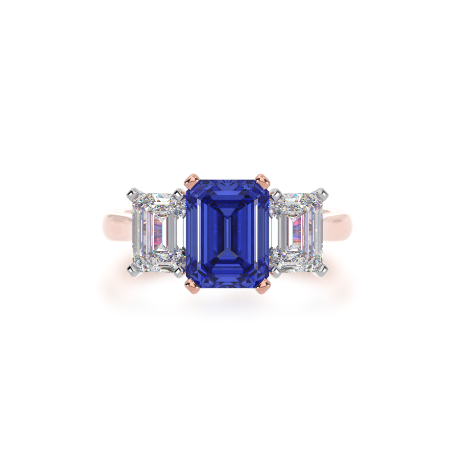 Trilogy emerald cut blue sapphire and diamond ring on rose gold band view from top