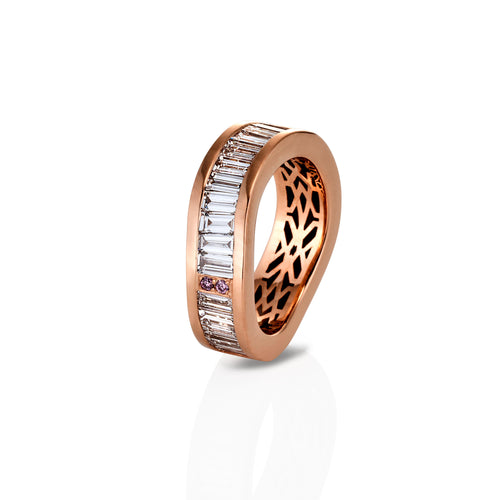 Lumiere Collection Wave Ring with white and pink diamonds, displayed balanced on its side.  The image is on a white background with a reflection shadow on the ring in the foreground.