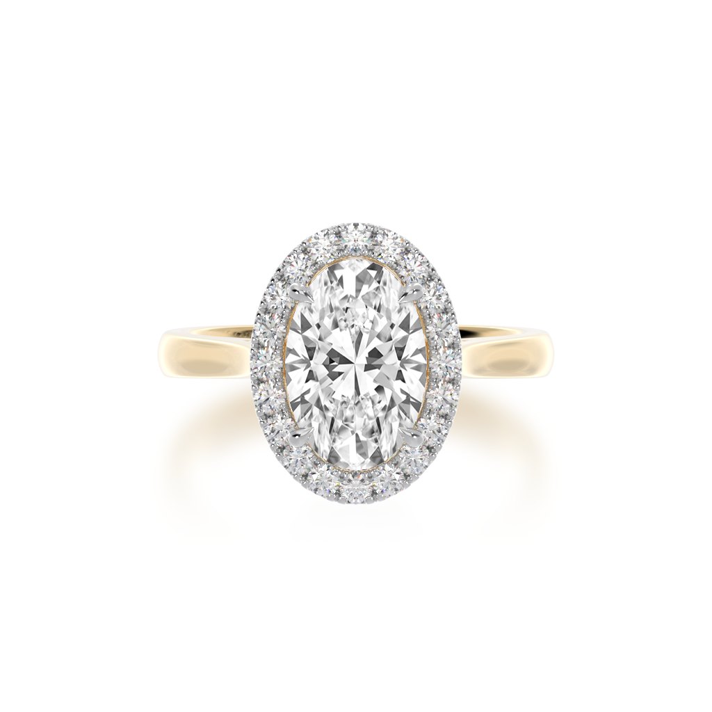 Oval cut diamond halo ring on yellow gold band – Mondial by Nadia