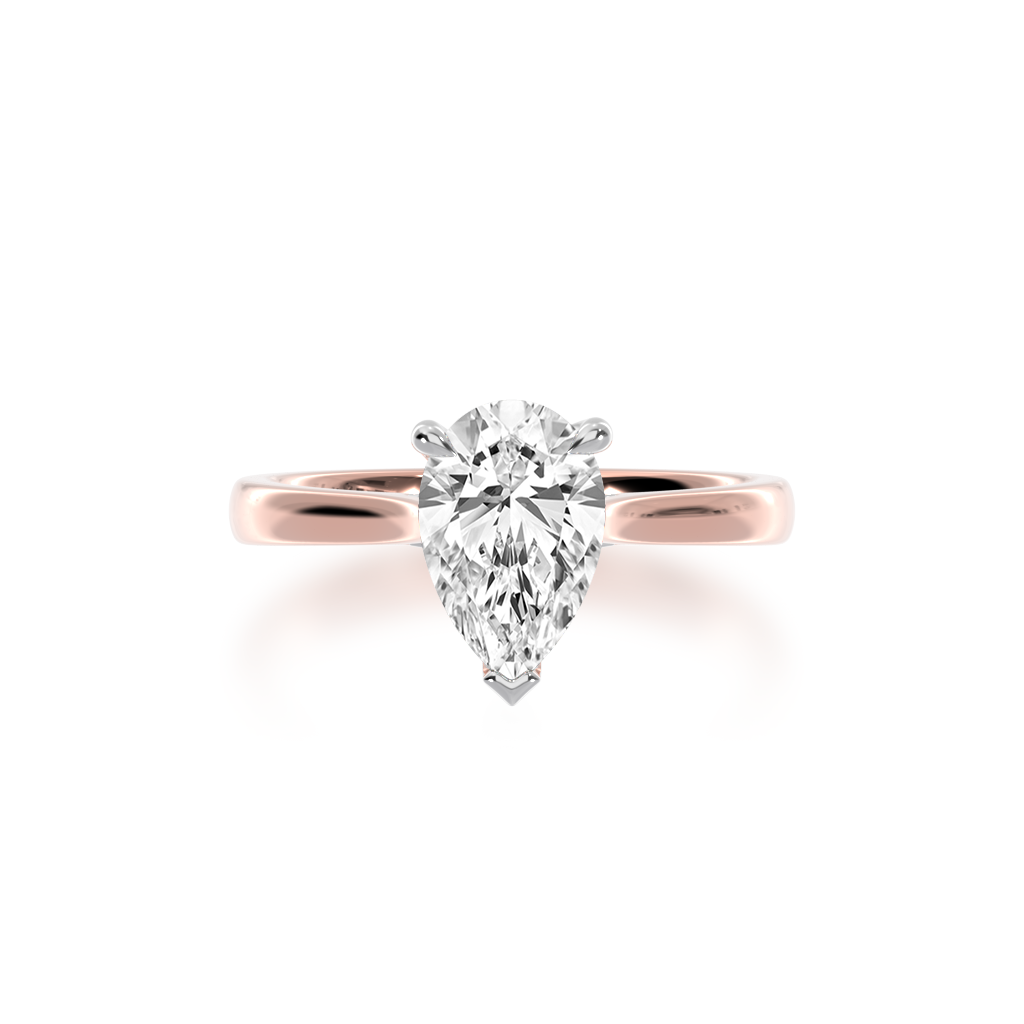Pear shaped diamond solitaire engagement ring on rose gold band