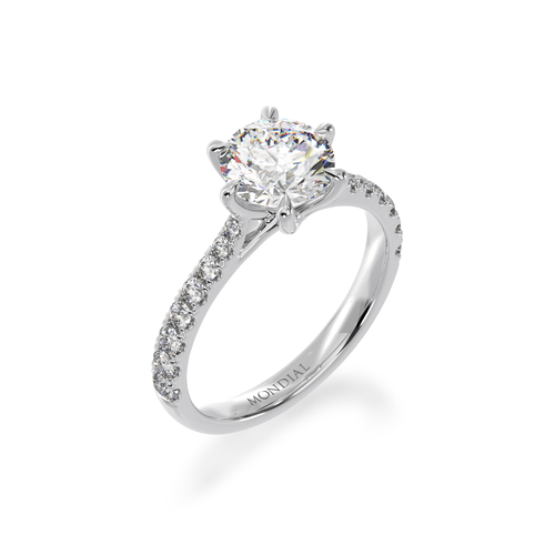 Round brilliant cut diamond solitaire engagement ring with diamond set band view from angle