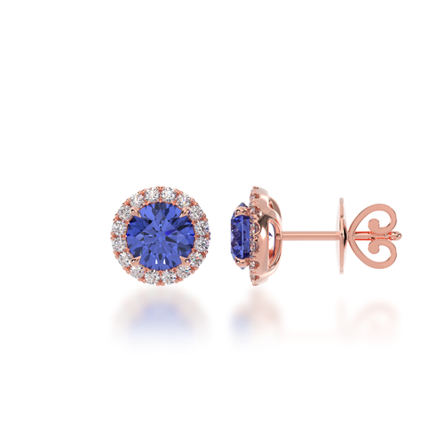 Round brilliant cut blue sapphire and diamond halo stud earrings view from side