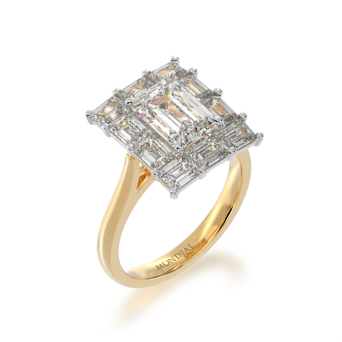 Emerald cut diamond cluster ring on yellow gold band view from angle