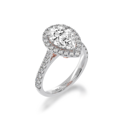 Pear shape diamond halo engagement ring with diamond set band view from angle