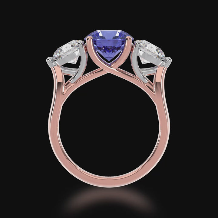 Round Brilliant cut trilogy blue Sapphire and Diamond ring on rose gold band 3d video