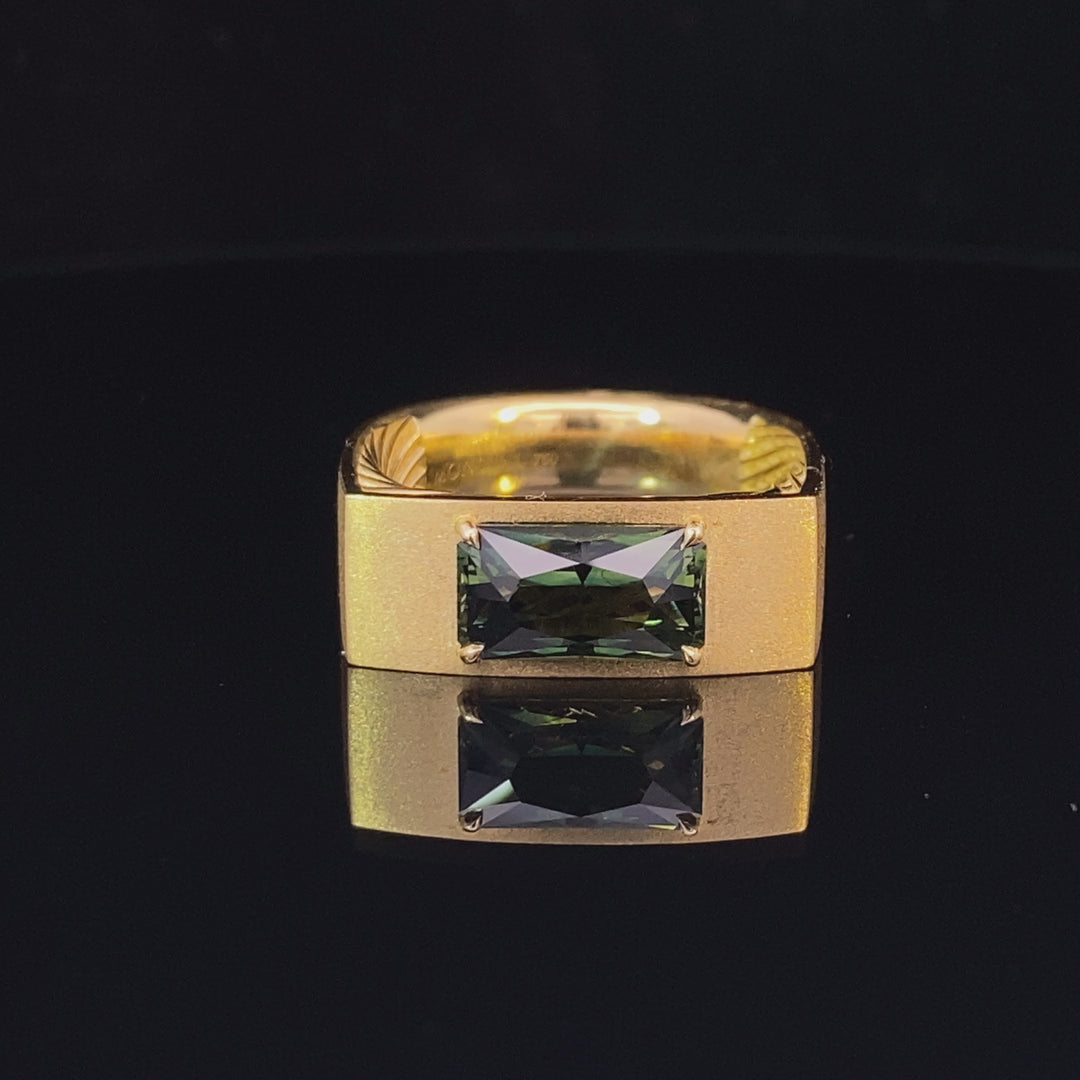 Green Parti Sapphire set in a yellow gold signet ring with a cross hatched profile video 