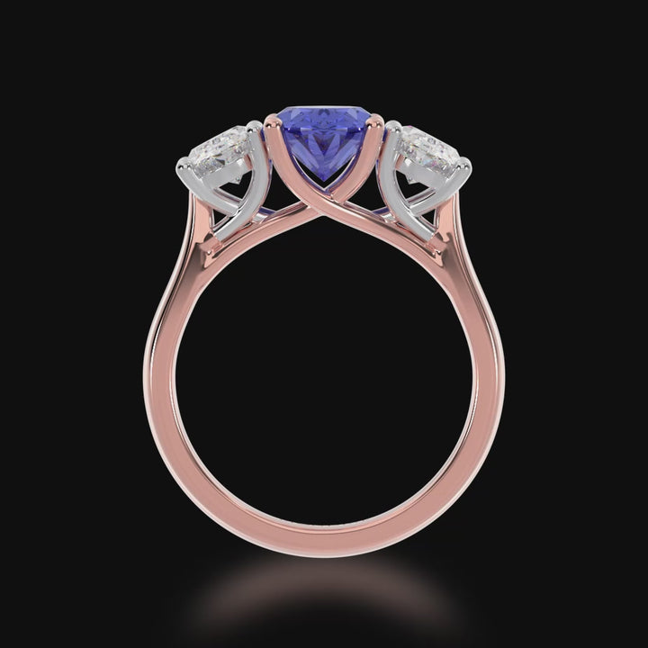 Trilogy oval cut blue sapphire and diamond ring on rose gold band 3d video