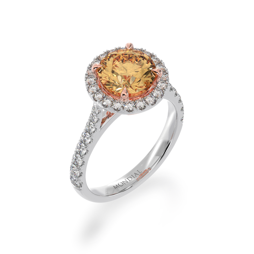 Round brilliant cut champagne diamond halo engagement ring with diamond set band view from angle
