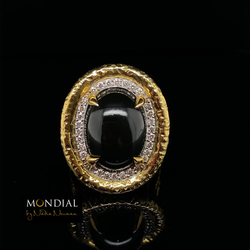 Front view of the Mondial by Nadia oval diamond ring with cabochon black Jade diamond halo ring on yellow gold band.