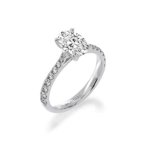 Solitaire Oval diamond ring with a white gold diamond set band from an angle view.