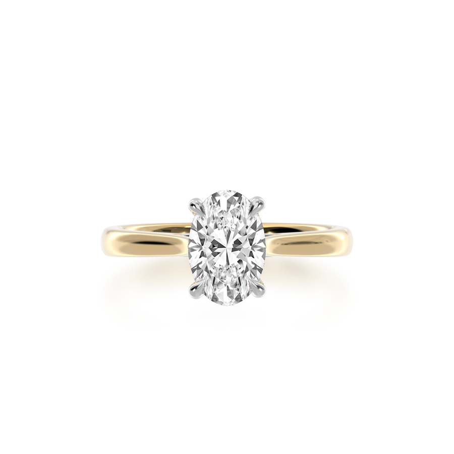 Oval cut diamond solitaire in yellow and white gold from above