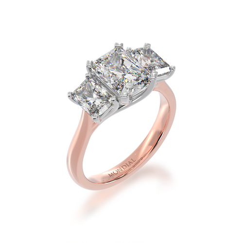 2 Carat Diamond Ring. Trilogy radiant cut diamond ring on rose gold band view from angle
