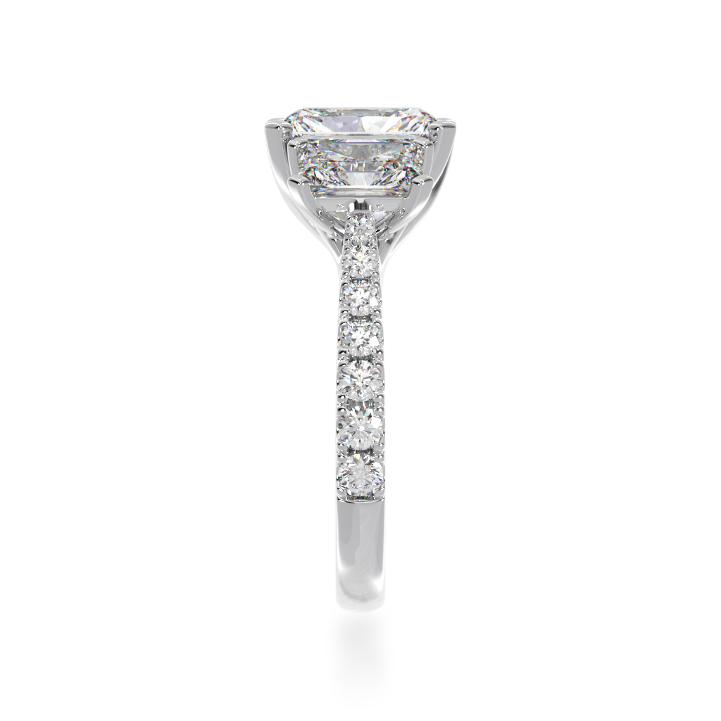 White Gold Trilogy radiant cut diamond ring with a diamond band from side