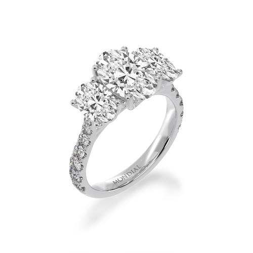 Trilogy oval diamond ring with diamond set band view from angle.