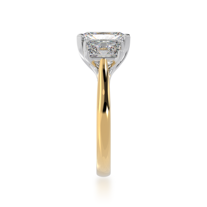 Trilogy radiant cut diamond ring on yellow gold band view from side