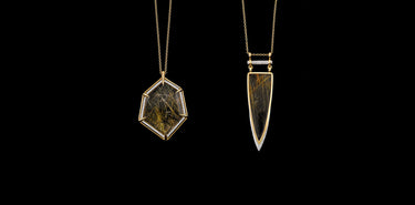 Contemporary Diamond and Gold Pendants on a black background