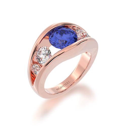 The Mondial by Nadia Flame design blue sapphire engagement ring with diamond five stone ring in rose gold view from angle.