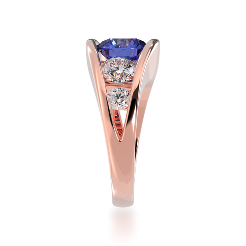 The Mondial by Nadia Flame design blue sapphire engagement ring with diamonds in rose gold view from side.