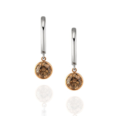 Pair of earrings with champagne diamond drops, photographed as a pair on a white background