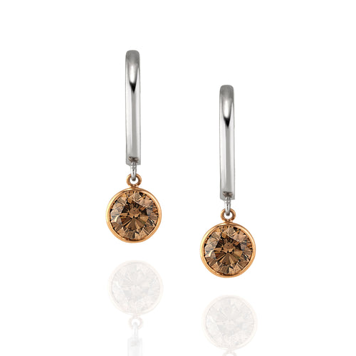 Pair of earrings with champagne diamond drops, photographed as a pair on a white background