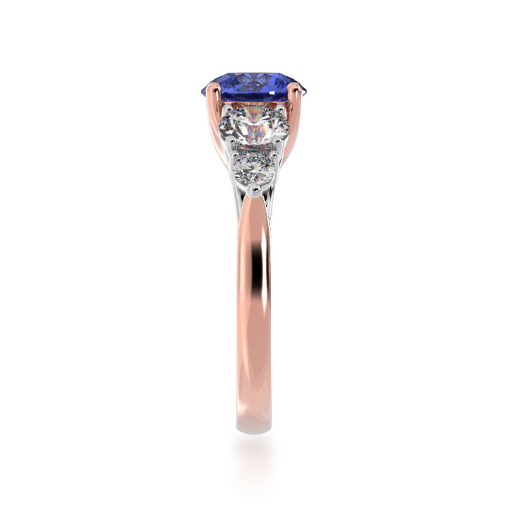Five stone round blue sapphire and white diamond ring from side