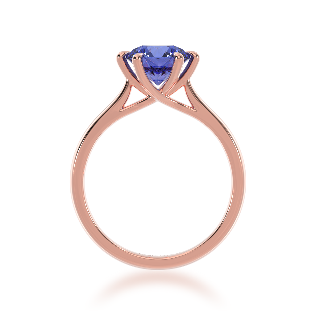 Brilliant cut blue sapphire solitaire on a rose gold band from front