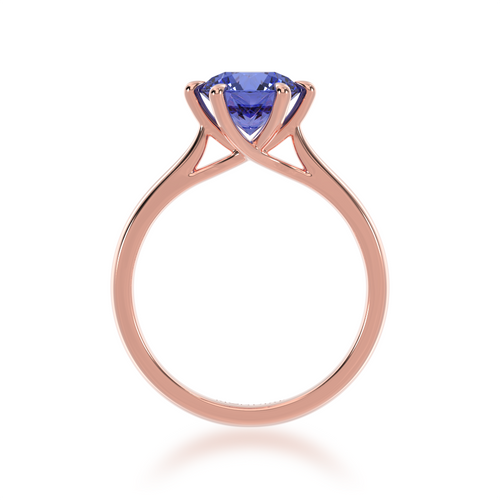 Brilliant cut blue sapphire engagement ring solitaire design on a rose gold band by Mondial by Nadia from front.