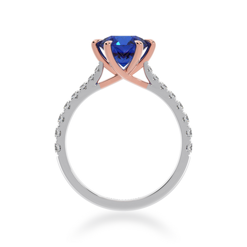 The Mondial by Nadia Round brilliant cut solitaire blue sapphire engagement ring with diamond set band view from front.