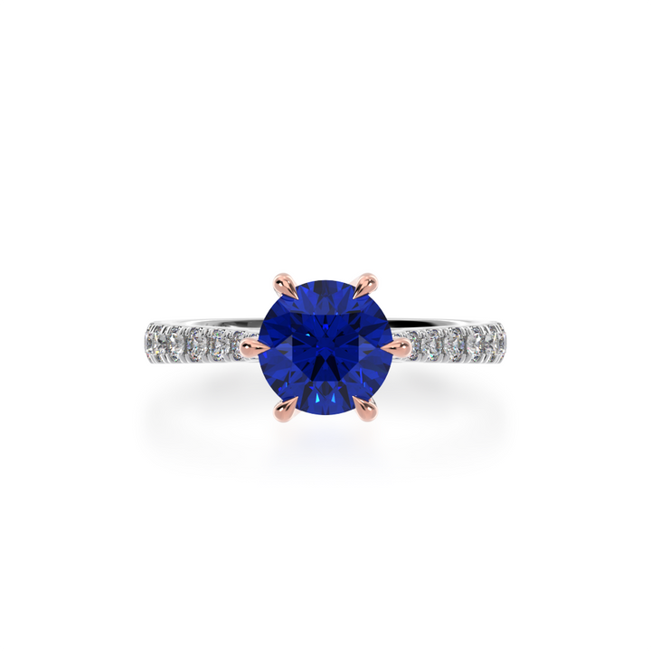 Round brilliant cut blue sapphire solitaire ring with diamond set band view from top