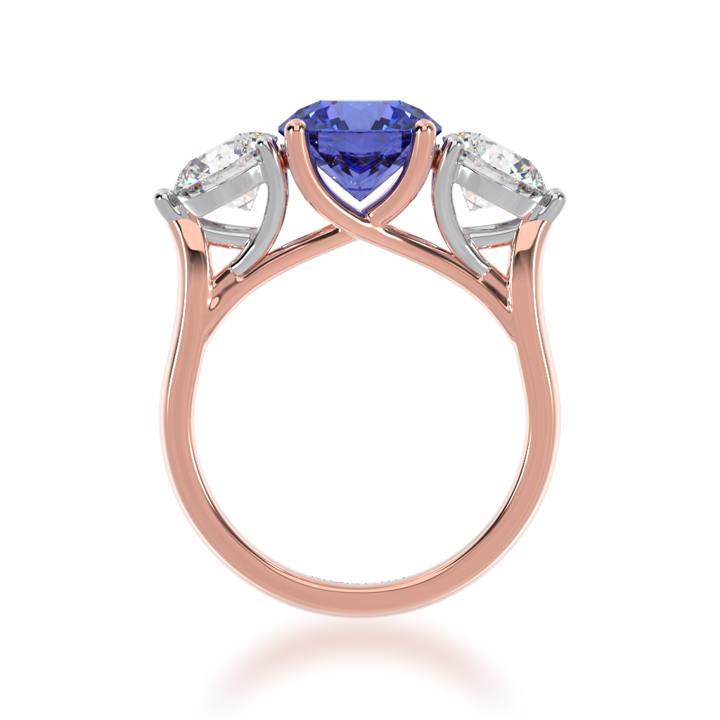 Round Brilliant cut trilogy blue Sapphire and Diamond ring on rose gold band view from front