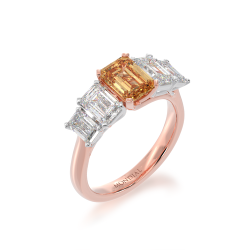 5 stone Emerald cut Champagne diamond and white diamond ring on angle