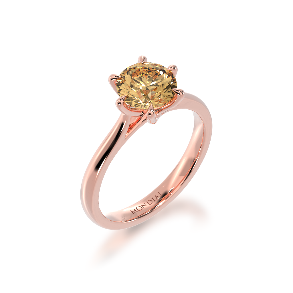Brilliant cut champagne diamond solitaire on a rose gold band from angle