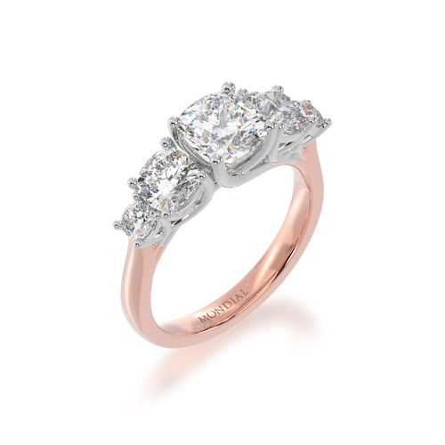 Five stone cushion cut ring on rose gold band view from angle