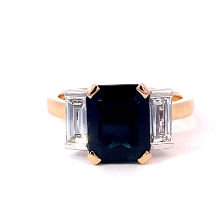 Emerald cut Australian black sapphire ring on rose gold band