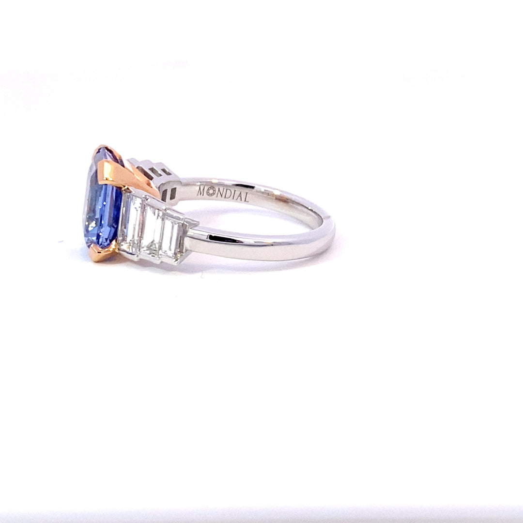 Radiant cut Ceylon blue sapphire and diamond ring on white gold band