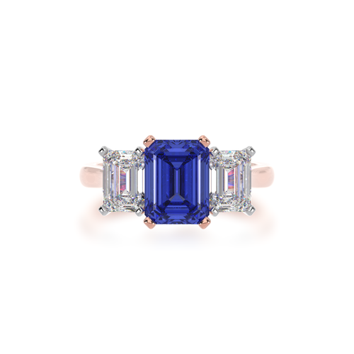 The Mondial by Nadia Trilogy emerald cut blue sapphire engagement ring with diamonds on rose gold band view from top.