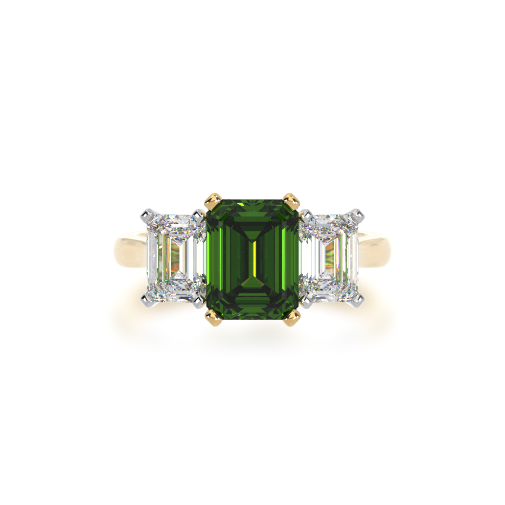 Trilogy emerald cut green sapphire and diamond ring on yellow gold band