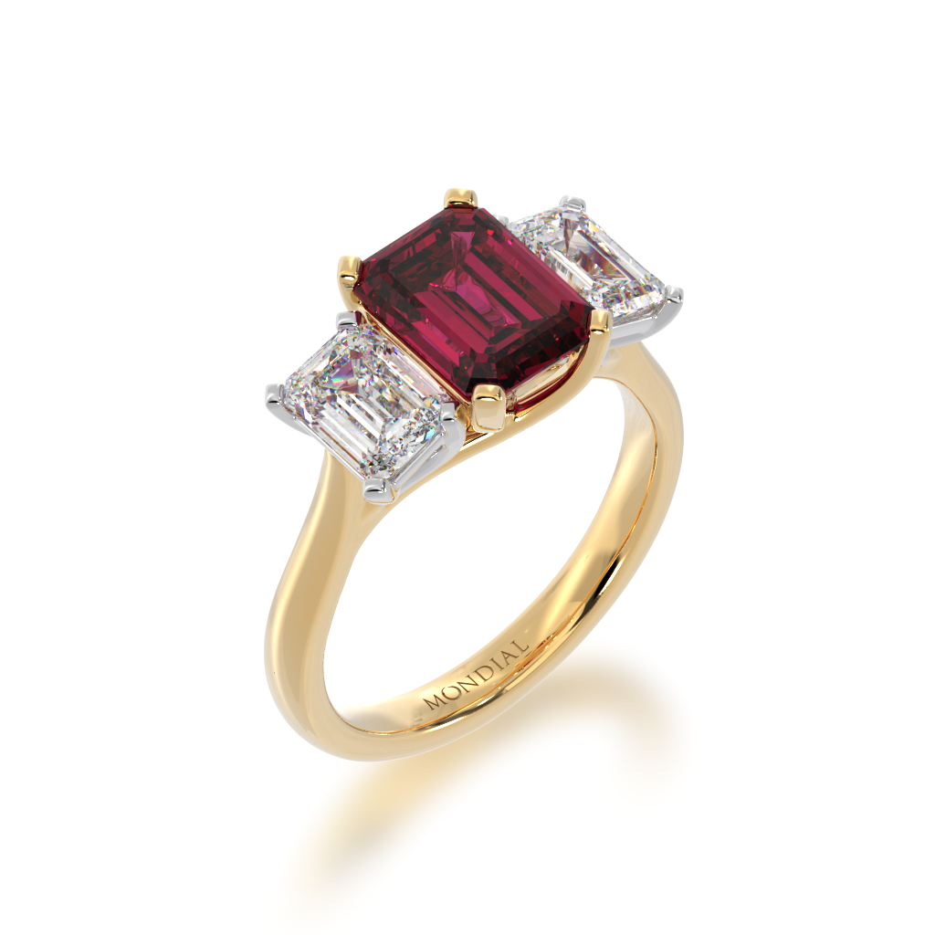 Trilogy emerald cut ruby and diamond ring on yellow gold band view from angle 