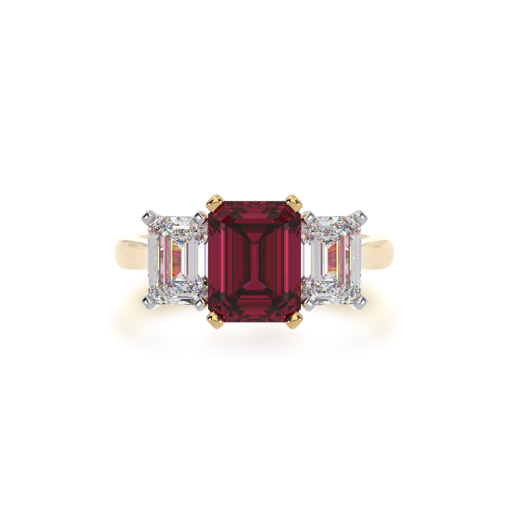 Trilogy emerald cut ruby and diamond ring on yellow gold band view from top