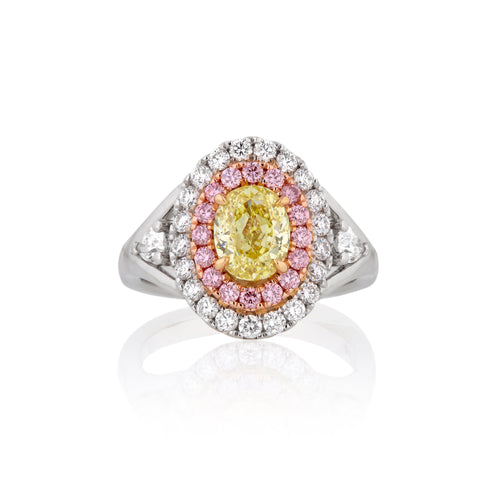 Natural "Fancy Intense Yellow" Oval diamond ring.