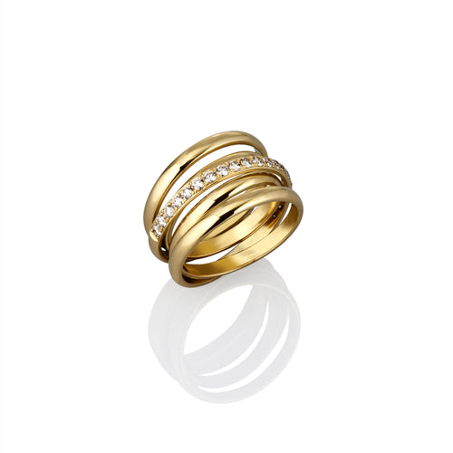 Interlocking design of gold bands with white diamond accents along one band shown from side view