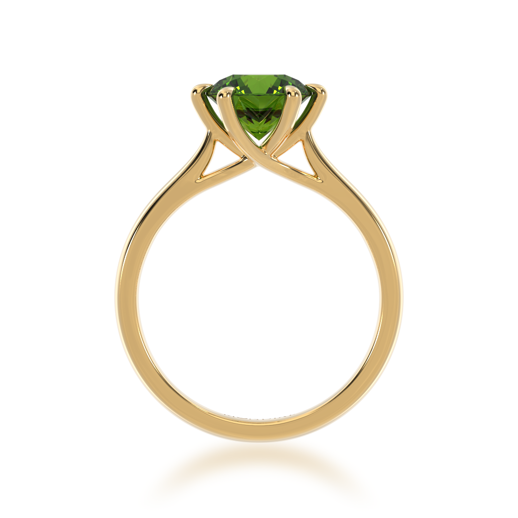 Brilliant cut green sapphire solitaire on a yellow gold band from front