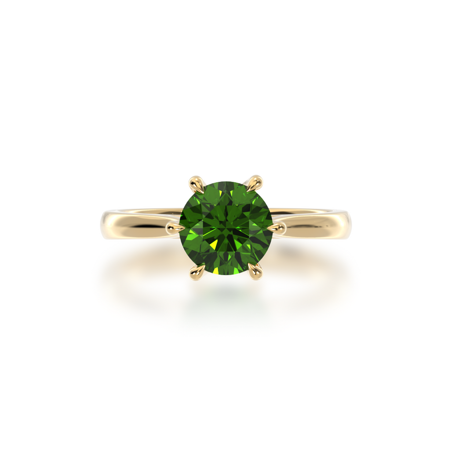 Brilliant cut green sapphire solitaire on a yellow gold band from top