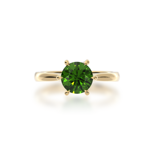 Brilliant cut green sapphire solitaire on a yellow gold band from top