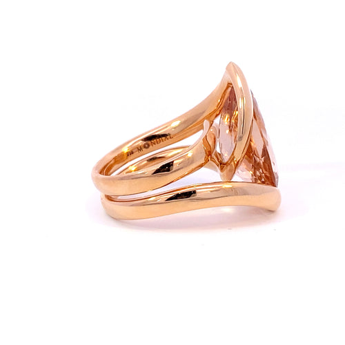 Pear shaped champagne peach coloured morganite ring in infinity design in rose gold view from side 